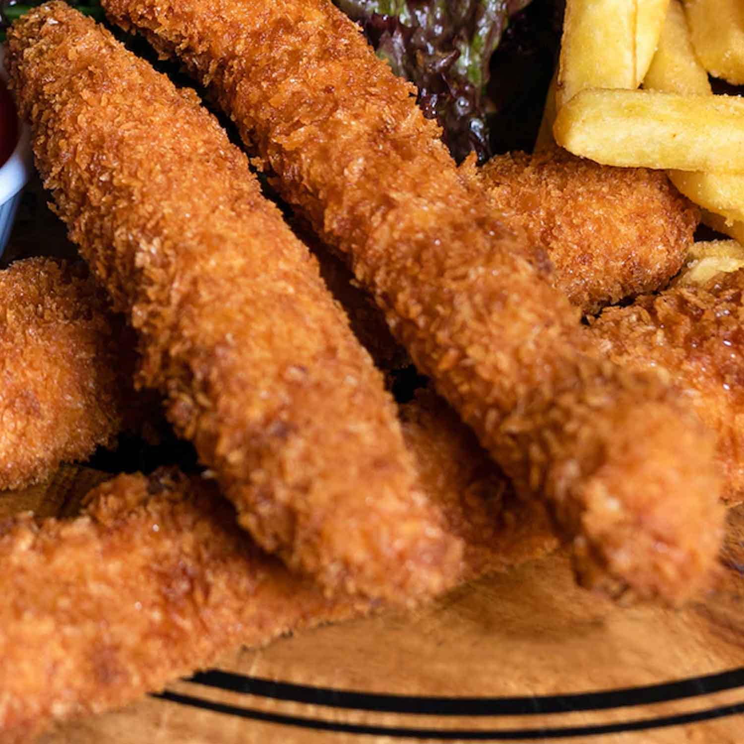 Buttermilk Chicken Strips Freezerland NFLD INC.